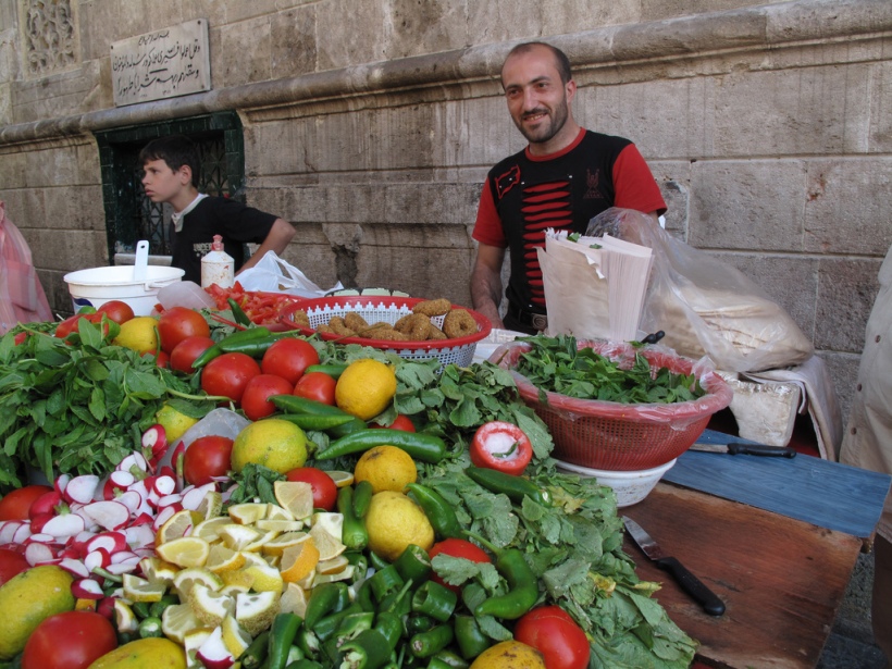 image by Daniel Roy, via Flickr CC; falafel stand in Aleppo, Syria.